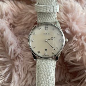 Gucci G timeless diamond mother of pearl Swiss watch